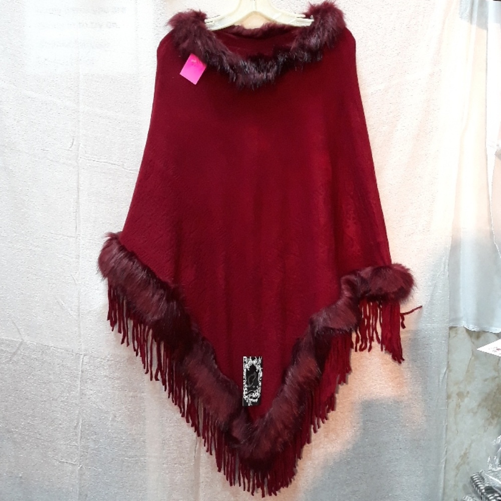 Poncho with faux fur trim